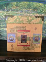 MaxSold Auction: Asian Tea-Themed Decorative Keepsake Box with Metal Accents - San Jose (California, USA) SELLER MANAGED Downsizing Online Auction - Paladin Drive