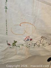 MaxSold Auction: Assorted Embroidered Tablecloths & Linens with Pastel Easter Motifs - San Jose (California, USA) SELLER MANAGED Downsizing Online Auction - Paladin Drive