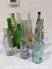 MaxSold Auction: Mixed Glass Soda and Beverage Bottles - Sacramento (California, USA) SELLER MANAGED Reseller Online Auction - Arden Way
