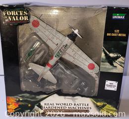 MaxSold Auction: 1:72 scale die-cast model of Mitsubishi A6M2 Zero fighter  - Ottawa (Ontario, Canada) SELLER MANAGED Downsizing Online Auction - Armstrong