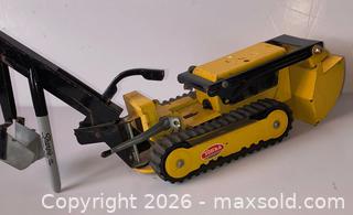 MaxSold Auction: 1960s pressed steel Tonka No. 534 Trencher Backhoe, NICE - Ottawa (Ontario, Canada) SELLER MANAGED Downsizing Online Auction - Armstrong