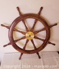 MaxSold Auction: Solid Wood 8-Spoke Ship's Wheel with Brass Hub — Nautical Decor - Kingston (Ontario, Canada) SELLER MANAGED Estate Sale Online Auction - Tamarac Street