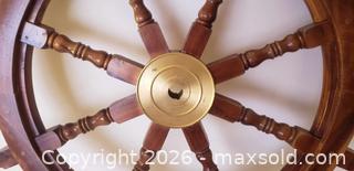 MaxSold Auction: Solid Wood 8-Spoke Ship's Wheel with Brass Hub — Nautical Decor - Kingston (Ontario, Canada) SELLER MANAGED Estate Sale Online Auction - Tamarac Street