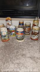MaxSold Auction: Lot of 9 Budweiser Lidded Beer Steins - South Hill (Washington, USA) SELLER MANAGED Estate Sale Online Auction - 117st Ct East (CONDO)