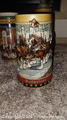 MaxSold Auction: Lot of 9 Budweiser Lidded Beer Steins - South Hill (Washington, USA) SELLER MANAGED Estate Sale Online Auction - 117st Ct East (CONDO)