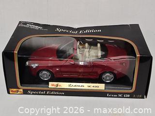 MaxSold Auction: Maisto Lexus SC 430 Die Cast Car  - Riverview (Florida, USA) SELLER MANAGED Downsizing Online Auction - Holly Heath Drive