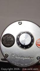 MaxSold Auction: Vintage High Speed Champion Reel - Riverview (Florida, USA) SELLER MANAGED Downsizing Online Auction - Holly Heath Drive