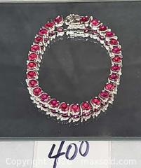 MaxSold Auction: Sterling Silver Ruby? Red Gemstone Tennis Bracelet  - Hatboro (Pennsylvania, USA) PARTNER MANAGED Estate Sale Online Auction -  Jacksonville Road