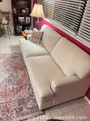 MaxSold Auction: Bassett 3-Seat Upholstered Sofa Beige Fabric - Fort Myers (Florida, USA) SELLER MANAGED Moving Online Auction - South Larkwood Square