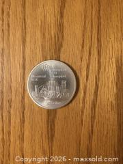 MaxSold Auction: 1976 Montreal Olympics $10 Silver coin Canada  - Kingston (Ontario, Canada) SELLER MANAGED Downsizing Online Auction - Juniper Drive