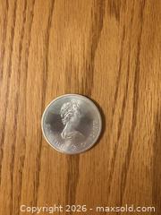 MaxSold Auction: 1976 Montreal Olympics $10 Silver coin Canada  - Kingston (Ontario, Canada) SELLER MANAGED Downsizing Online Auction - Juniper Drive