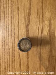 MaxSold Auction: 2005 Sealed Roll of Terry Fox loonies from the Canada mint  - Kingston (Ontario, Canada) SELLER MANAGED Downsizing Online Auction - Juniper Drive