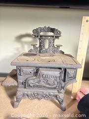 MaxSold Auction: Cast iron miniature parlor stoves lot of 2 — Crescent & Queen - Warwick (Rhode Island, USA) SELLER MANAGED Reseller Online Auction - Warwick Avenue