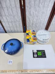 MaxSold Auction: Kitchen Lot: Lodge Blue Enameled Cast-Iron Pan, Cutting Board, Containers - Warwick (Rhode Island, USA) SELLER MANAGED Reseller Online Auction - Warwick Avenue