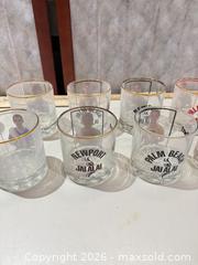 MaxSold Auction: Lot of 12 Promotional Jai Lai Rocks Glasses with Jai Lai Bobblehead - Warwick (Rhode Island, USA) SELLER MANAGED Reseller Online Auction - Warwick Avenue