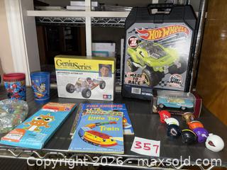 MaxSold Auction: Mixed Toy Lot: Hot Wheels Carry Case (48) + Tamiya Kit, Little Golden Book - Warwick (Rhode Island, USA) SELLER MANAGED Reseller Online Auction - Warwick Avenue