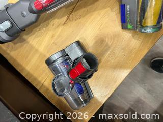 MaxSold Auction: Dyson vacuum and accessories  - Brampton (Ontario, Canada) PARTNER MANAGED Reseller Online Auction - Rosedale Avenue West, Brampton, On, Canada