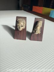 MaxSold Auction: Pair of Tribal/Ethnic Mask Bookends, approx. 4–5 in. tall - Clarkstown (New York, USA) SELLER MANAGED Downsizing Online Auction -  Old Mill Road