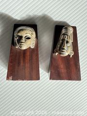 MaxSold Auction: Pair of Tribal/Ethnic Mask Bookends, approx. 4–5 in. tall - Clarkstown (New York, USA) SELLER MANAGED Downsizing Online Auction -  Old Mill Road