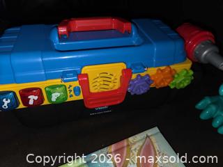 MaxSold Auction: Dino-Crew Crunchin' T-rex, Vtech Drill & Learn Toddler toolbox,  Vtech Turn & Learn Driver toy, & Vtech Spin & Learn color changing Flashlight, hardco - Los Angeles  (California, USA) SELLER MANAGED Estate Sale Online Auction - Granville Avenue