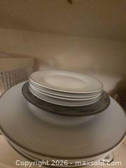 MaxSold Auction: Dishes in the cabinet.  Bottom Shelf Center cabinet - Los Angeles  (California, USA) SELLER MANAGED Estate Sale Online Auction - Granville Avenue