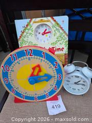 MaxSold Auction: Does anybody really know what time it is? .....Melissa & Doug Turn & Tell Wooden Learning Clock with Accessories - Los Angeles  (California, USA) SELLER MANAGED Estate Sale Online Auction - Granville Avenue