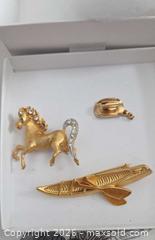 MaxSold Auction: Monet Gold-Tone Cowboy Hat, plus, Gold and Rhinestone Horse & a  Canoe Brooch/Pin - Los Angeles  (California, USA) SELLER MANAGED Estate Sale Online Auction - Granville Avenue