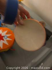MaxSold Auction: Musical Instruments: Multicolor Kids Percussion Set with Maracas, Drums, Tambourine, & Light0up Batons - Los Angeles  (California, USA) SELLER MANAGED Estate Sale Online Auction - Granville Avenue