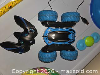 MaxSold Auction: Outdoor fun! RC Monster car with charger, frisbee, football, & other toys - Los Angeles  (California, USA) SELLER MANAGED Estate Sale Online Auction - Granville Avenue