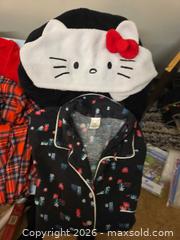 MaxSold Auction: PJ's for all!  Hello Kitty - adult Onsie, Plaid set,  Christmas Purple set & Red set.  - Los Angeles  (California, USA) SELLER MANAGED Estate Sale Online Auction - Granville Avenue
