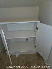 MaxSold Auction: White Wood Two-Door Cabinet with Adjustable Shelf - Los Angeles  (California, USA) SELLER MANAGED Estate Sale Online Auction - Granville Avenue