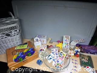 MaxSold Auction: Wood Cigar box, wicker waste basket, Xena postcards book, stickers, stacking doll- wood angel - Los Angeles  (California, USA) SELLER MANAGED Estate Sale Online Auction - Granville Avenue