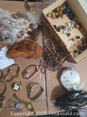 MaxSold Auction: Wrist watches, Feathers, leather, wood beads, sand dollars - Los Angeles  (California, USA) SELLER MANAGED Estate Sale Online Auction - Granville Avenue