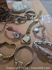 MaxSold Auction: Wrist watches, Feathers, leather, wood beads, sand dollars - Los Angeles  (California, USA) SELLER MANAGED Estate Sale Online Auction - Granville Avenue