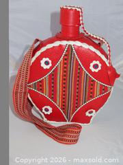 MaxSold Auction: Vintage Leather Wrapped Wine Bottle Decanter EMPTY - San Bruno (California, USA) SELLER MANAGED Downsizing Online Auction - 2nd Avenue