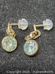 MaxSold Auction: 10K Gold (1.08g), Blue Moissanite (2.1ct). Handcrafted; Dangle design. - Toronto (Ontario, Canada) PARTNER MANAGED Downsizing Online Auction - Yonge Street