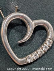 MaxSold Auction: Silver(2.91g)CZ Earring  - Toronto (Ontario, Canada) PARTNER MANAGED Downsizing Online Auction - Yonge Street