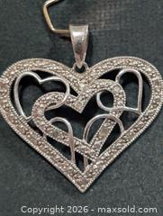 MaxSold Auction: Silver(3.06g) Diamond Pendant  - Toronto (Ontario, Canada) PARTNER MANAGED Downsizing Online Auction - Yonge Street