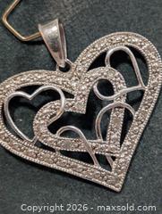 MaxSold Auction: Silver(3.06g) Diamond Pendant  - Toronto (Ontario, Canada) PARTNER MANAGED Downsizing Online Auction - Yonge Street