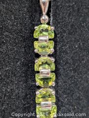 MaxSold Auction: Silver(3.88g) Peridot Pendant  - Toronto (Ontario, Canada) PARTNER MANAGED Downsizing Online Auction - Yonge Street