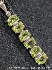 MaxSold Auction: Silver(3.88g) Peridot Pendant  - Toronto (Ontario, Canada) PARTNER MANAGED Downsizing Online Auction - Yonge Street