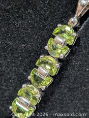 MaxSold Auction: Silver(3.88g) Peridot Pendant  - Toronto (Ontario, Canada) PARTNER MANAGED Downsizing Online Auction - Yonge Street