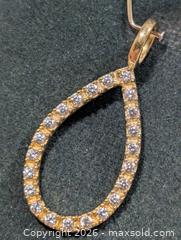 MaxSold Auction: Silver CZ Pendant  - Toronto (Ontario, Canada) PARTNER MANAGED Downsizing Online Auction - Yonge Street