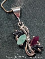 MaxSold Auction: Silver Emerald, Sapphire,Ruby Pendant  - Toronto (Ontario, Canada) PARTNER MANAGED Downsizing Online Auction - Yonge Street