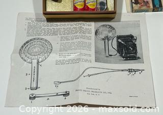MaxSold Auction: Collection Of Vintage Camera Flash Accessories - Burlington (Ontario, Canada) SELLER MANAGED Estate Sale Online Auction - Fairview Street (STORAGE)