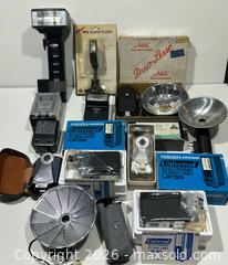 MaxSold Auction: Collection of Vintage Camera Flash Units and Accessories - Burlington (Ontario, Canada) SELLER MANAGED Estate Sale Online Auction - Fairview Street (STORAGE)