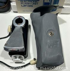 MaxSold Auction: Collection of Vintage Camera Flash Units and Accessories - Burlington (Ontario, Canada) SELLER MANAGED Estate Sale Online Auction - Fairview Street (STORAGE)