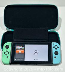 MaxSold Auction: Nintendo Switch Animal Crossing Edition Handheld Console with Case - Burlington (Ontario, Canada) SELLER MANAGED Estate Sale Online Auction - Fairview Street (STORAGE)