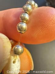 MaxSold Auction: Sterling silver bead ring on elastic  - Markham (Ontario, Canada) SELLER MANAGED Downsizing Online Auction - Loring Crescent