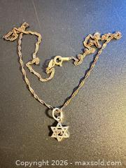 MaxSold Auction: Sterling silver necklace 15” with small David’s star pendant  - Markham (Ontario, Canada) SELLER MANAGED Downsizing Online Auction - Loring Crescent